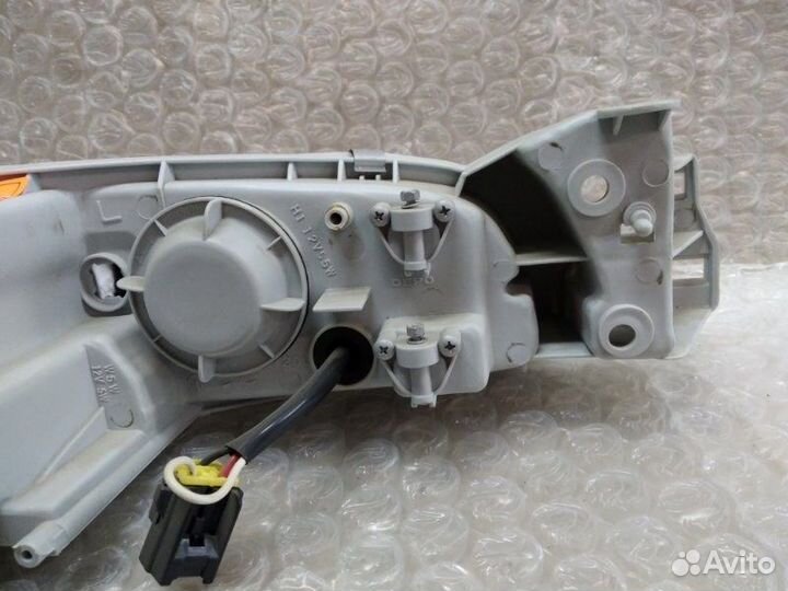 Фара левая Mazda 626 1991 - 1997