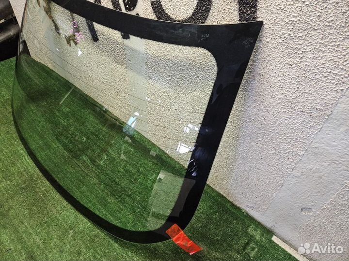 Стекло заднее на Almera G15