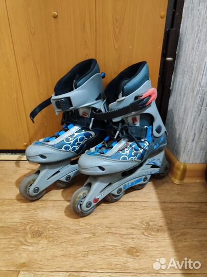 Роликовые коньки