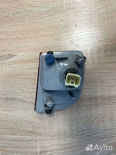 Фонарь задний левый Toyota Land Cruiser 200