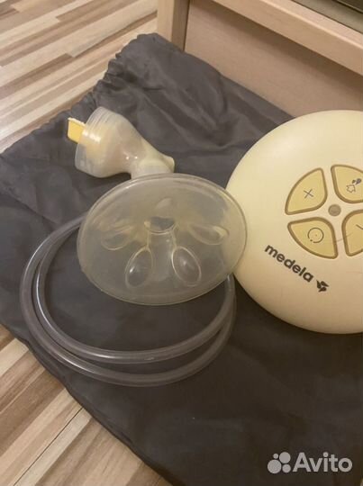Молокоотсос medela электрический