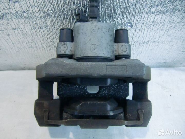 Суппорт тормозной задний BMW X5 E70 F15 X6 E71 F