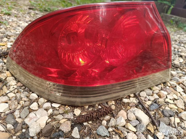 Фонарь задний левый lancer 9