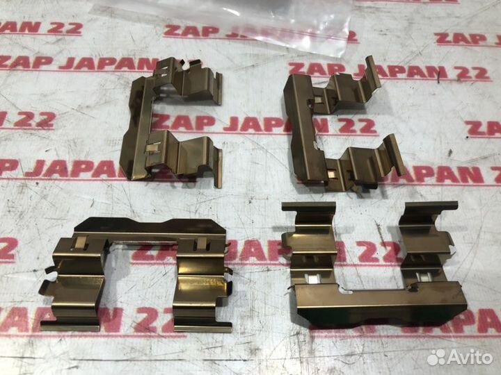 Зажим тормозных колодок передний Mitsubishi L200