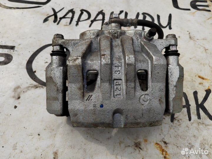 Суппорт тормозной передний левый Lexus Rx4 Rx200T