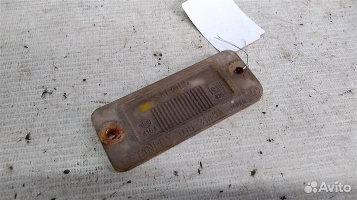 Фонарь подсветки номера Mitsubishi Pajero 2 91-97г