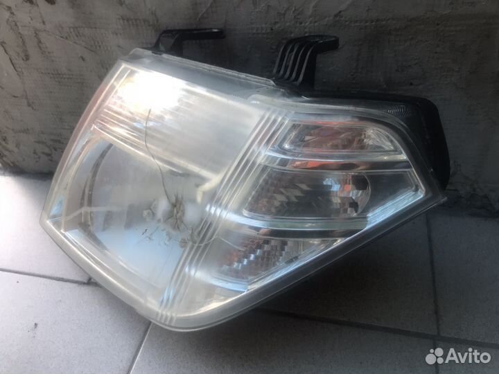 Фара левая галоген рест Nissan Navara D40