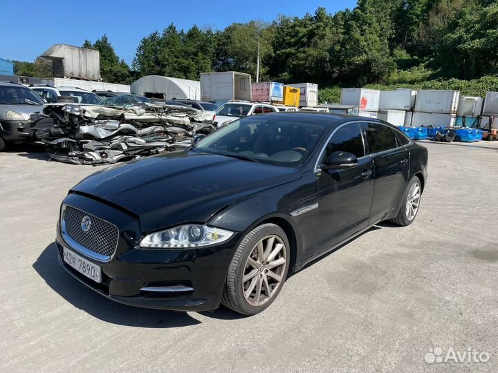 Форсунка омывателя фар Jaguar Xj Левая