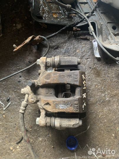 Kia sportage 4 суппорт задний правый