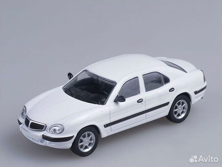 Газ 3111 белый 1:43