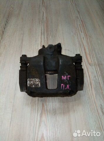 Суппорт тормозной перед Geely emgrand EC7 Лев