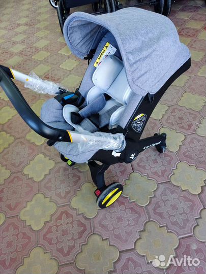 Автолюлька на колесах фофо