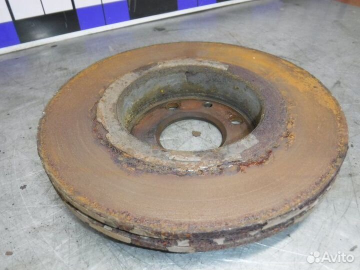 Тормозной диск передний правый Nissan Almera G15