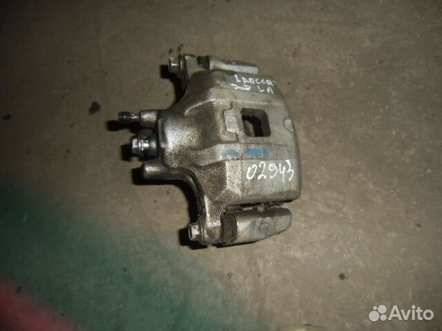 Суппорт передний левый Mitsubishi Lancer X 2007-н