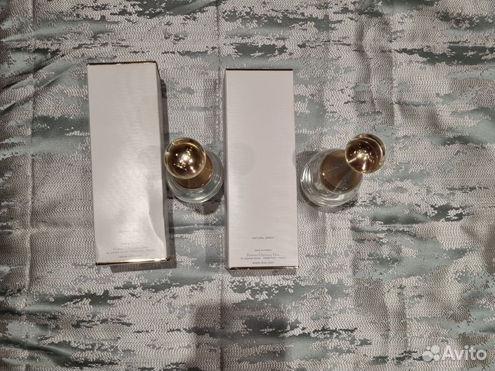 Пустые флаконы от парфюма Dior Jadore