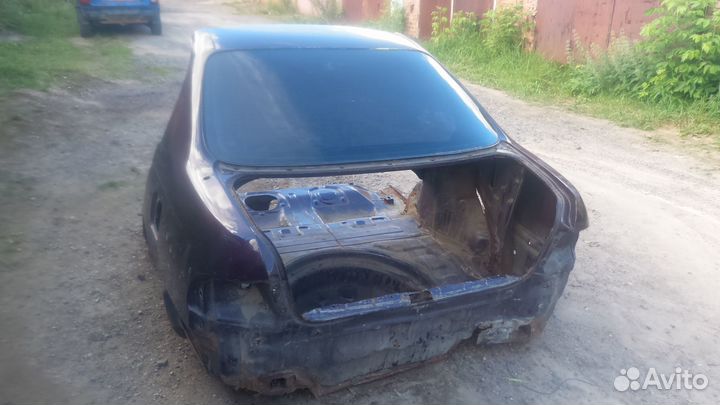 Задняя часть тойота карина Е