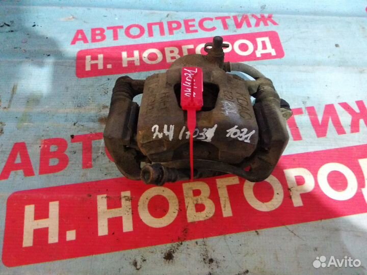 Суппорт передний левый Шевроле Авео Т250