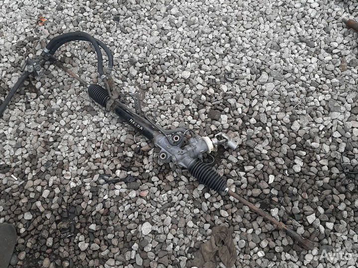 Рейка рулевая Мазда Примаси Фемели 323