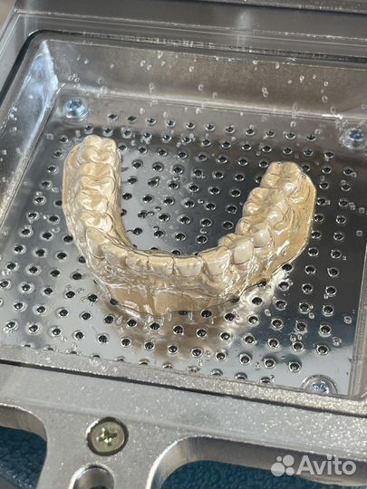 Зубной техник