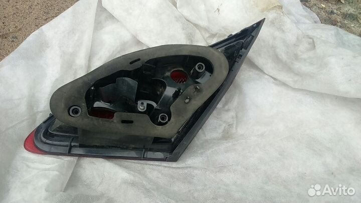 Фонарь левый внутренний Opel Astra J