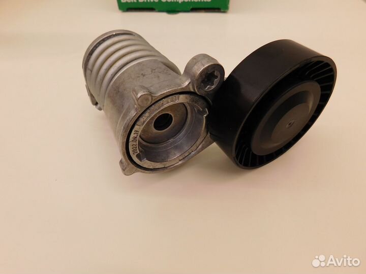 Ролик с натяжителем ремня двс в сборе