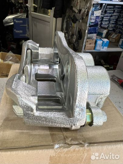 Тормозной супорт Hyundai Grand starex 58180-4HA00