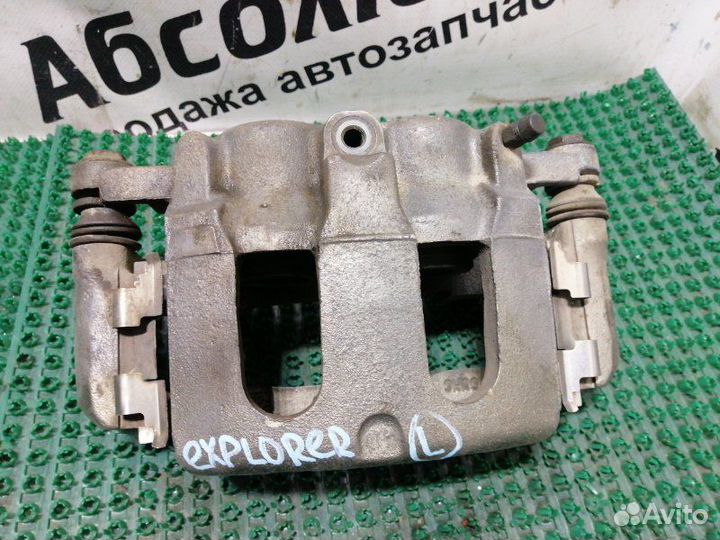 Суппорт тормозной передний левый Ford Explorer