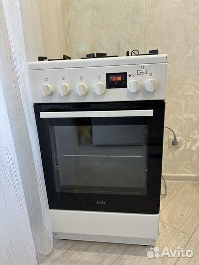 Газовая плита с электрической духовкой AEG