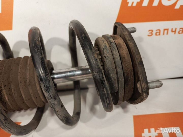 Стойка амортизатора передняя левая Mazda 6