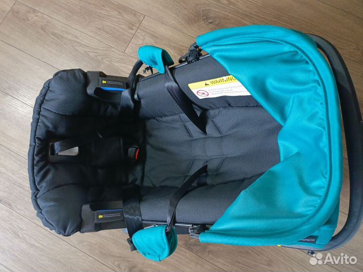 Автолюлька на колесах для новорожденных