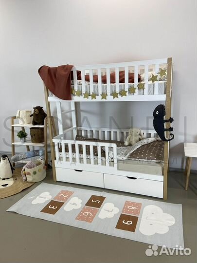 Двухярусная детская кровать