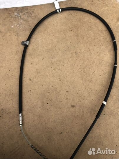 Трос ручника левый Mitsubishi Galant