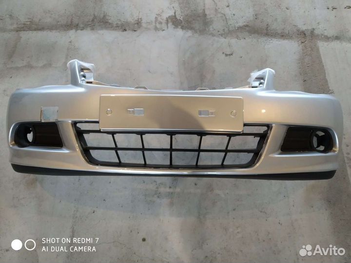 Бампер Ниссан Альмера G15. новый,серебристый