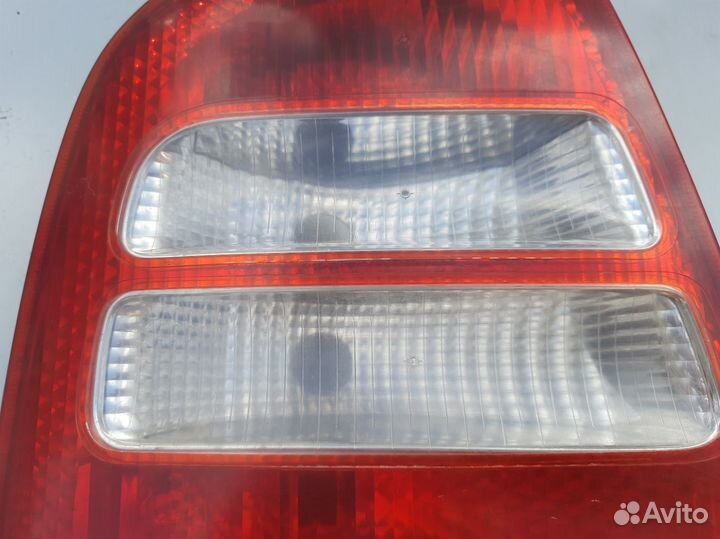 Фонарь левый Skoda Octavia A4 Tour