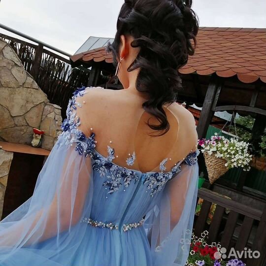 Швея портной в ателье