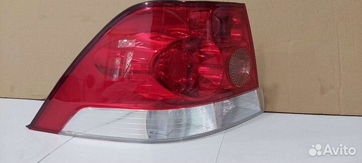 Фонарь левый Opel Astra H седан