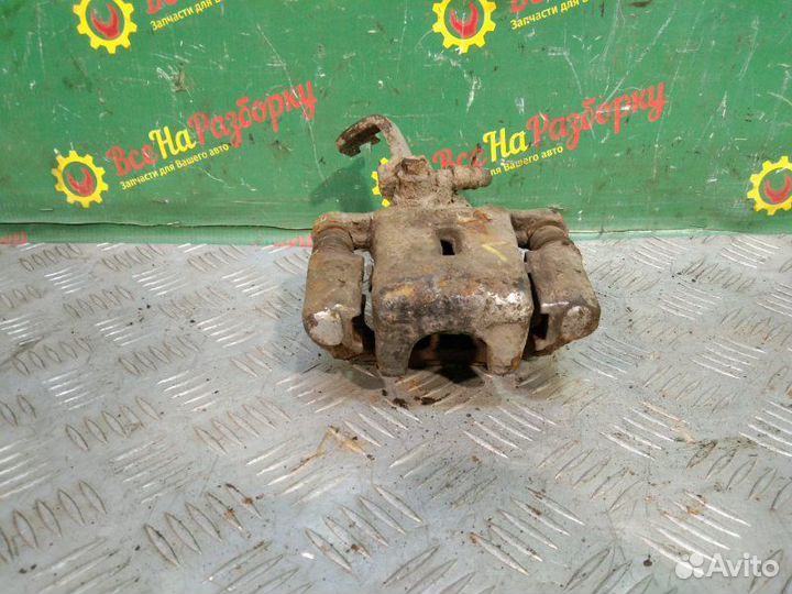 Суппорт задний левый Hyundai Lantra универсал