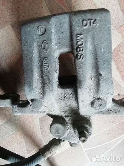 Суппорт задний KIA sportage 3. 2010-2015