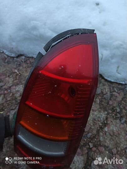 Opel Astra G (универсал) фонарь правый оригинал