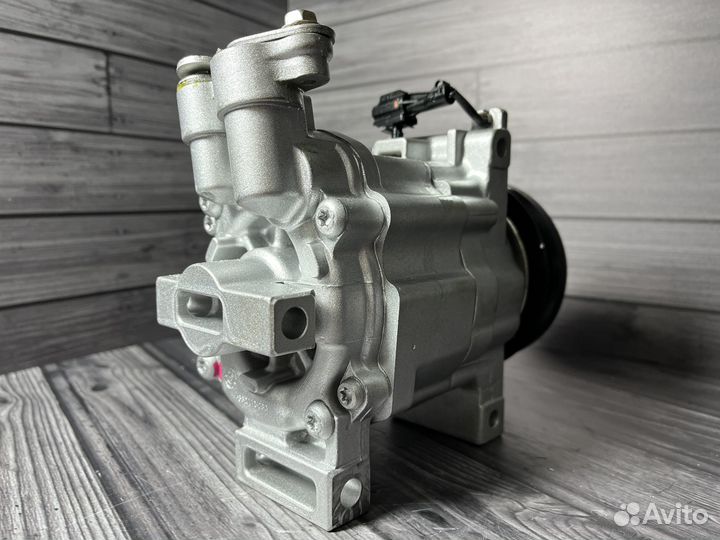 Компрессор кондиционера Subaru Impreza