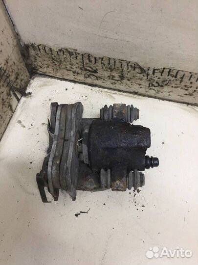 Суппорт задний левый Ford Explorer