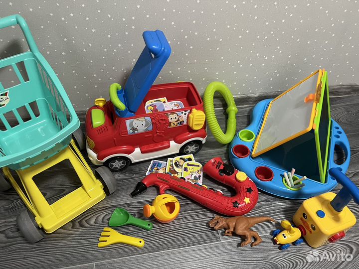 Машинка-каталка развивающие игрушки мольберт