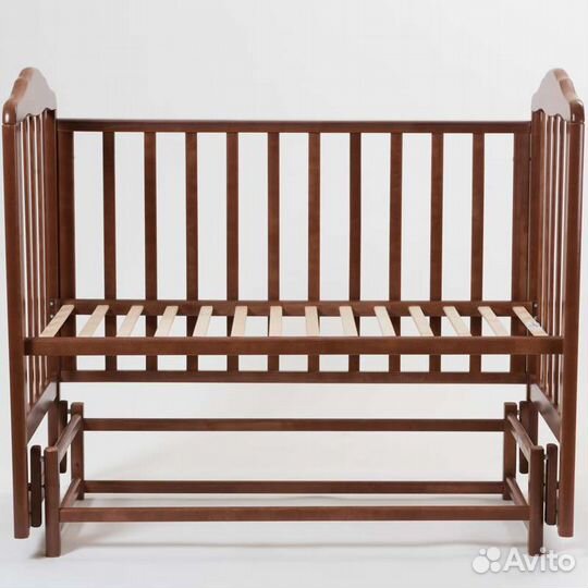 Детская кроватка-маятник