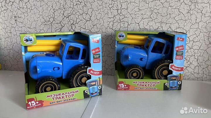 Развивающая игрушка синий трактор