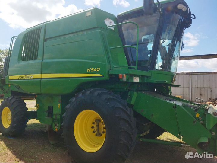 Комбайн John Deere W Series, 2011