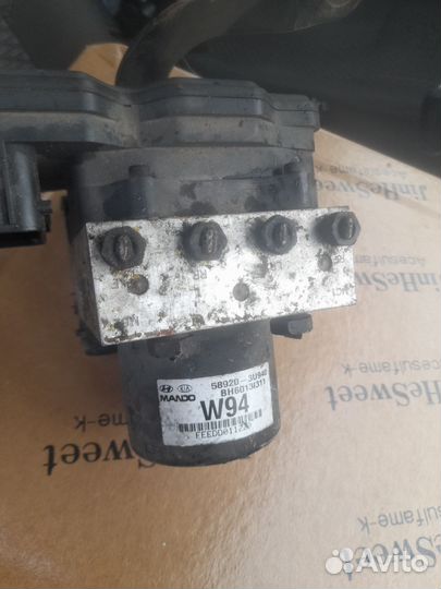 Блок ABS Kia Sportage 589203U940