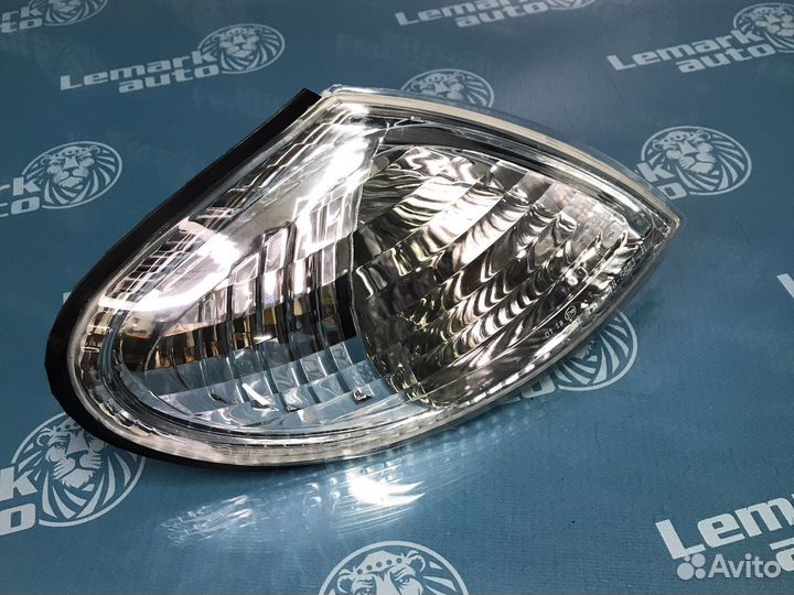 Указатель поворота правый белый Nissan Almera