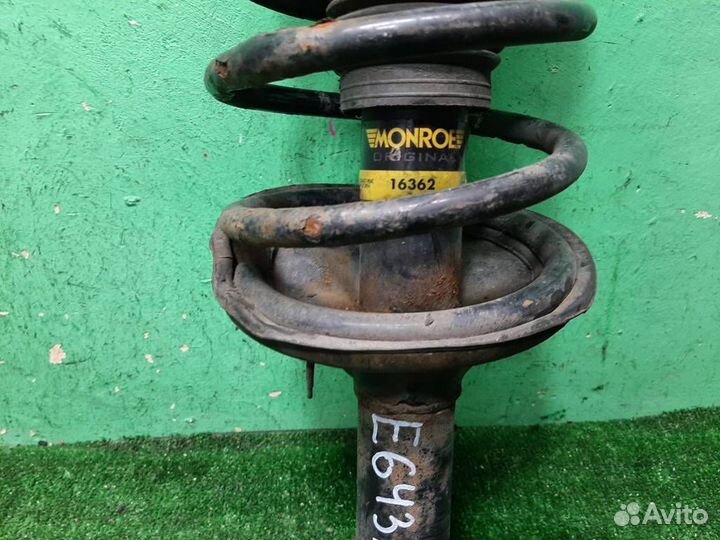 Стойка амортизатора передняя левая Hyundai Matrix