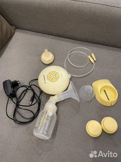 Молокоотсос medela swing электрический