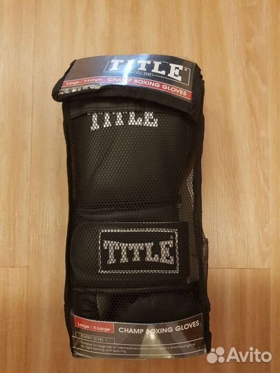 Боксерские перчатки title